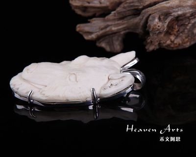 象骨饰品中的狼文化 挂珠的艺术与企业管理启示